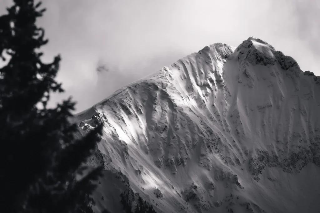 Winter mountain in the Austrian Alps with dramatic light and shadow, illustrating how visualisation helps photographers anticipate contrast and mood.