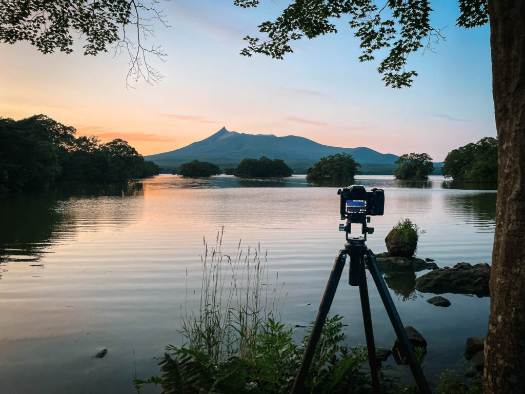 landscape-photography-camera-on-tripod-lake-onuma-mount-komagatake-hokkaido