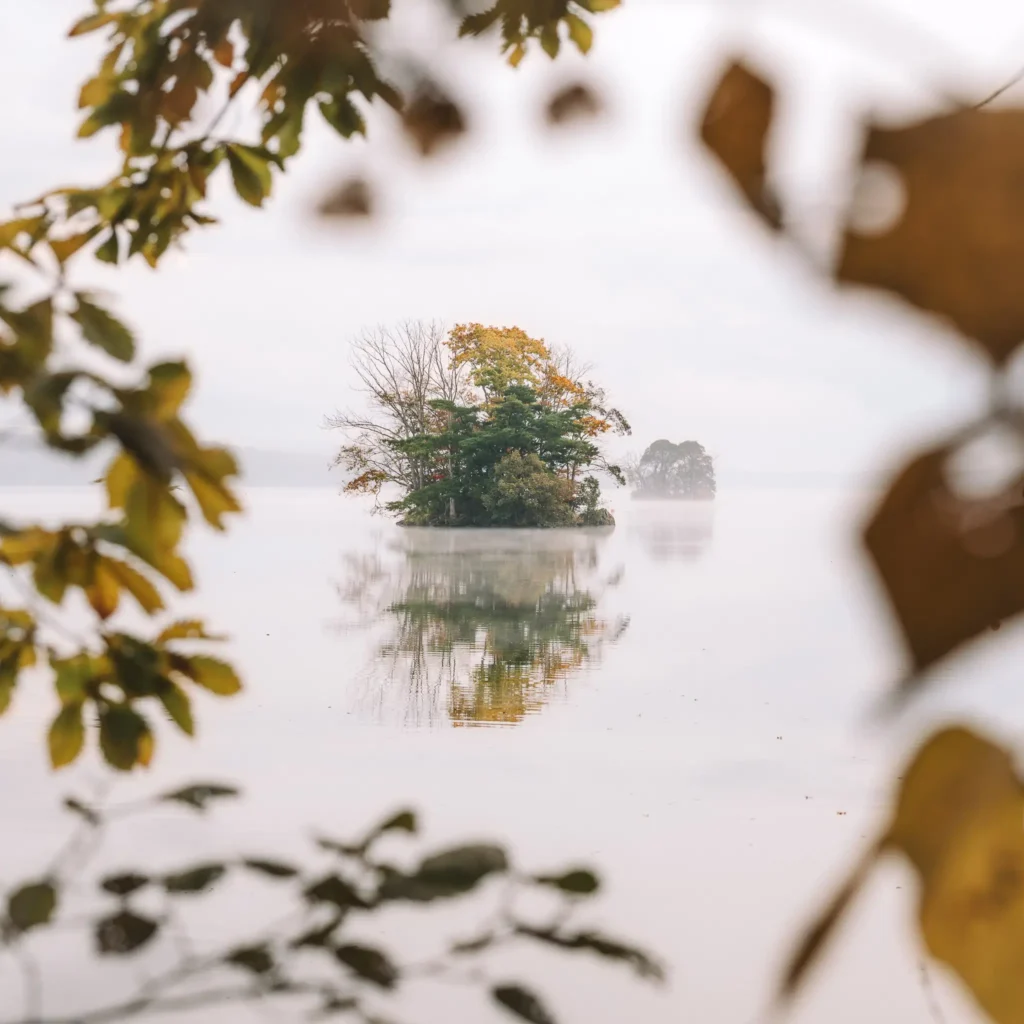 Small island reflection on Lake Onuma in autumn Hokkaido Japan